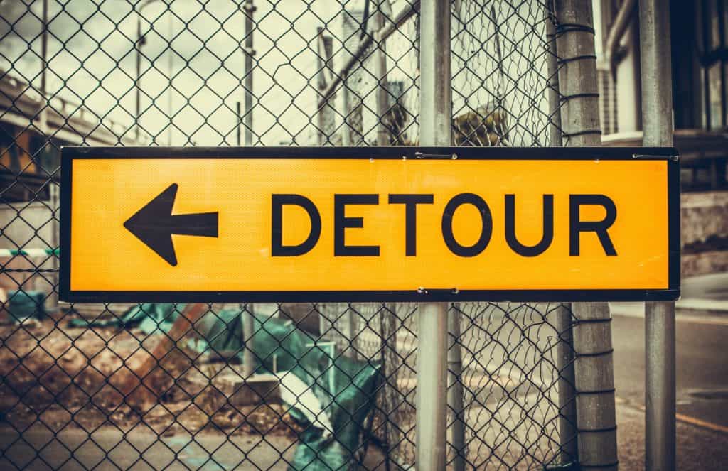 yellow-and-black-detour-signage; Photo by Luan Oosthuizen from Pexels
