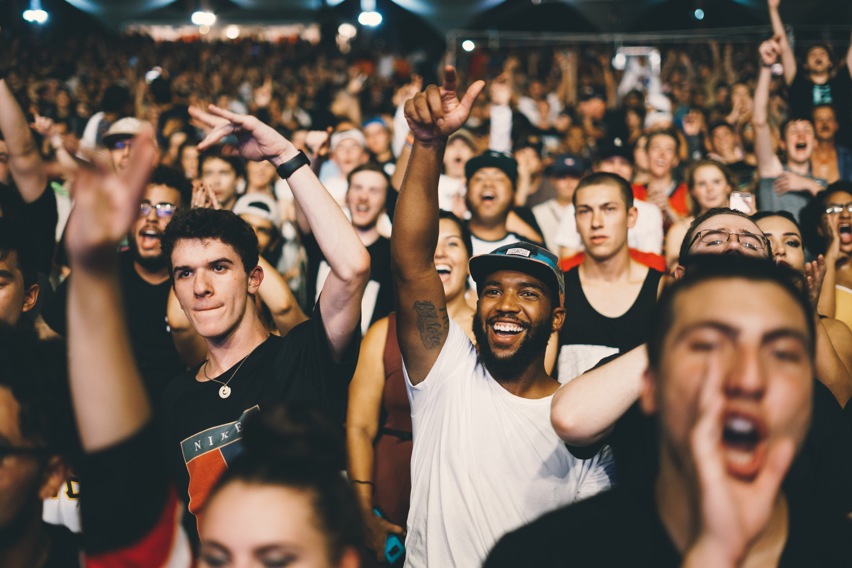 fans at a Logic concert; Photo by Nicholas Green from Unsplash